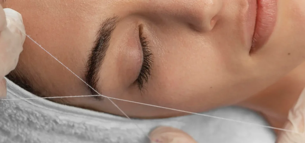 depilación cejas hilo Málaga